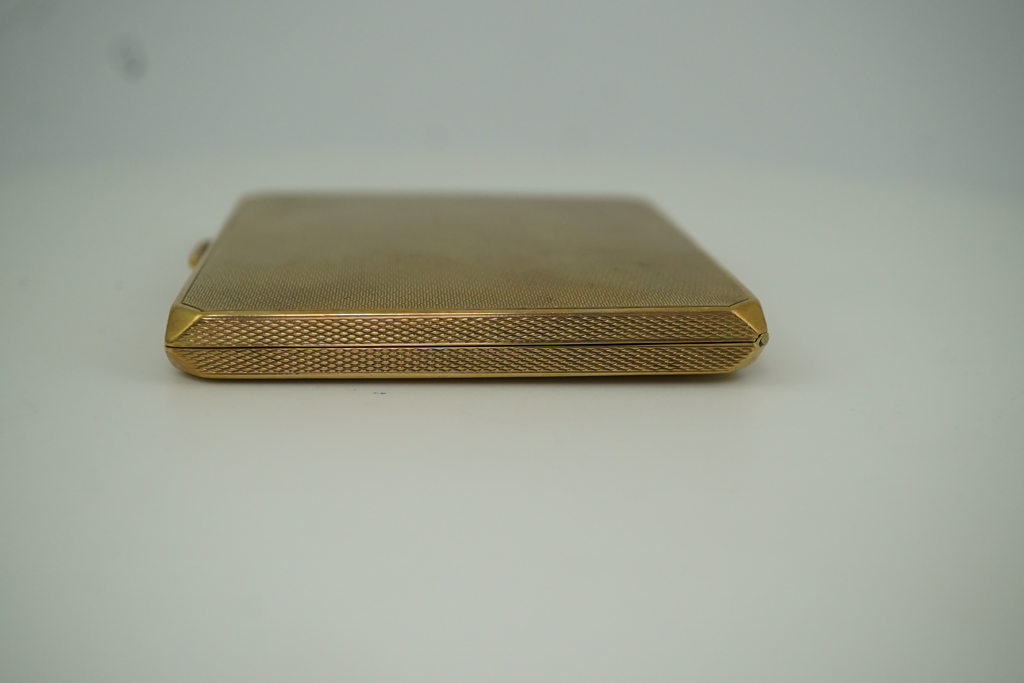 A 9ct gold cigarette case, circa 1930